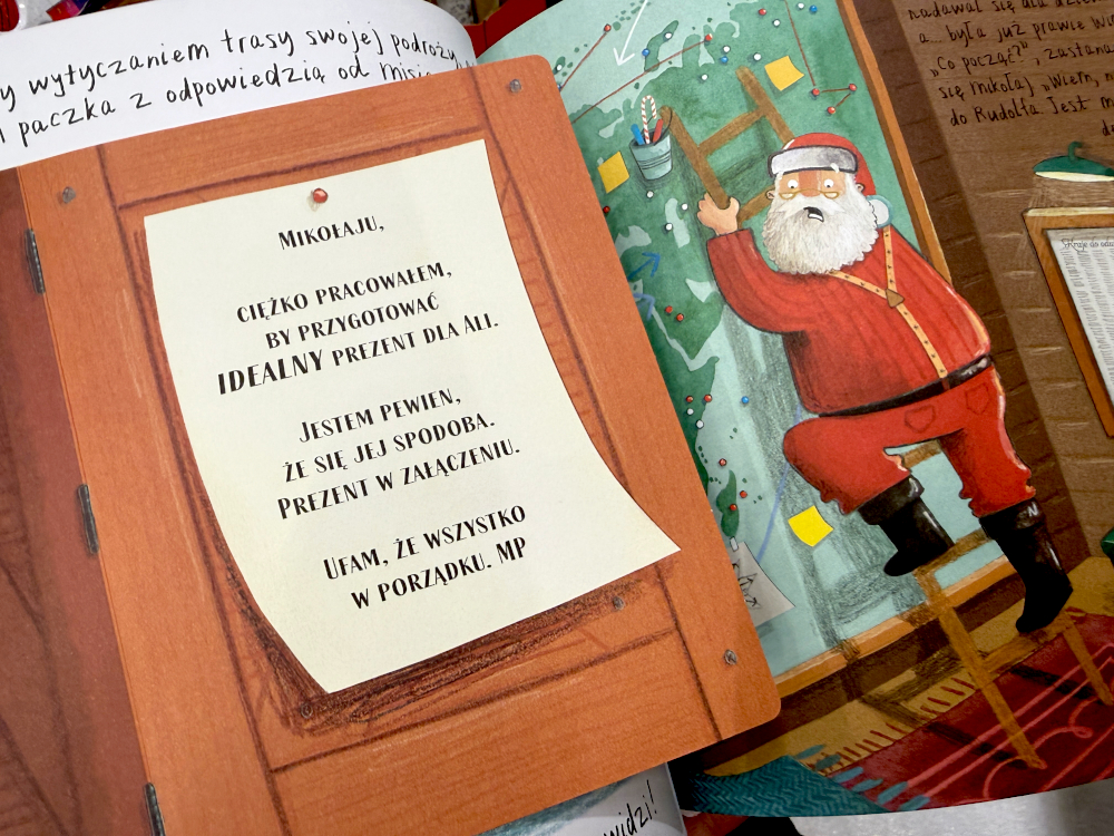 Mikołaj wspina się pod drabinie