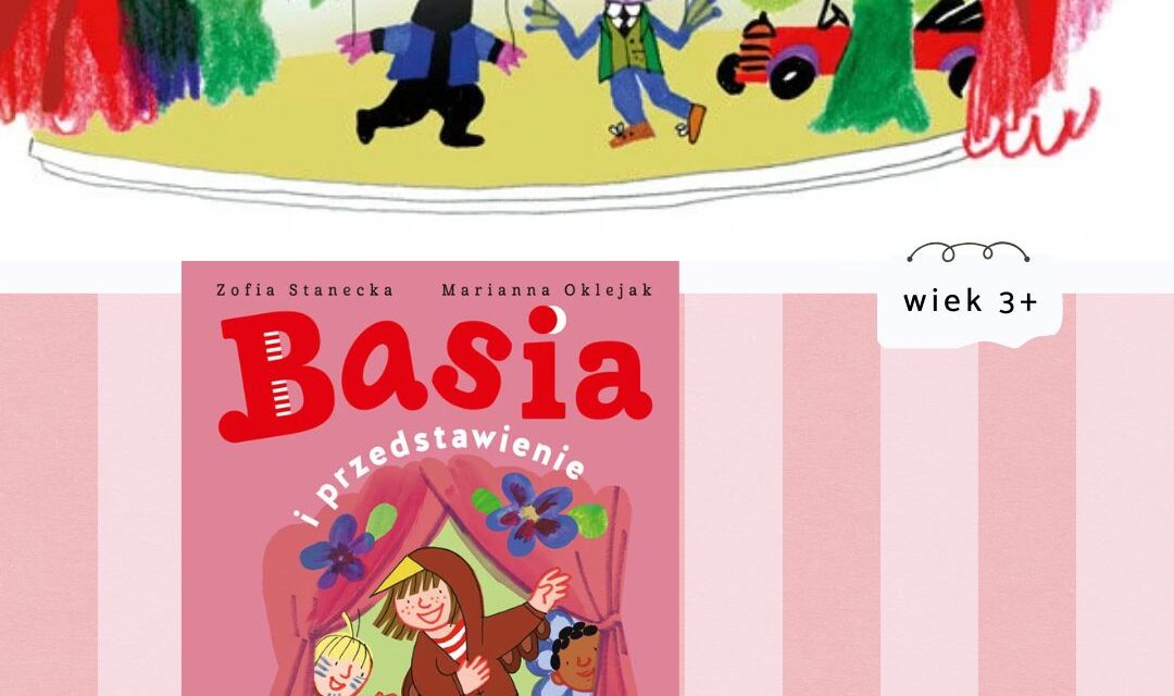 Okładka książki Basia i przedstawienie – Basia stojąca na scenie w jasnym świetle reflektorów, uśmiechnięta i gotowa do występu, w charakterystycznej czerwonej bluzce w paski.