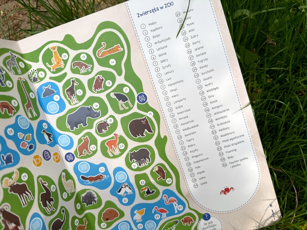 Mapa zoo w książce dla dzieci z rozmieszczeniem wybiegów oraz listą gatunków zwierząt dostępnych do odnalezienia