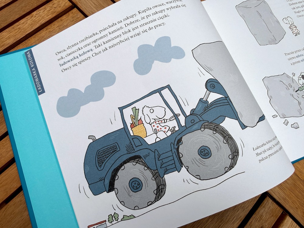 Ilustracja z książki dla dzieci przedstawiająca owcę prowadzącą ładowarkę kołową transportującą głaz
